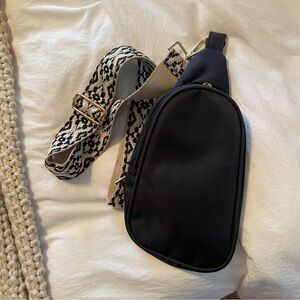 Stylish Black Crossbody Bag with Patterned Strap